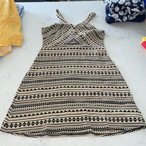 Black and tan pattern dress